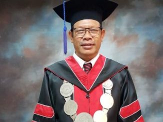 Pertahankan Disertasi, Dekan FH UKI Hulman Panjaitan Raih Gelar Doktor dengan Yudisium Magna Cumlaude
